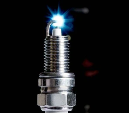 how does spark plugs work
